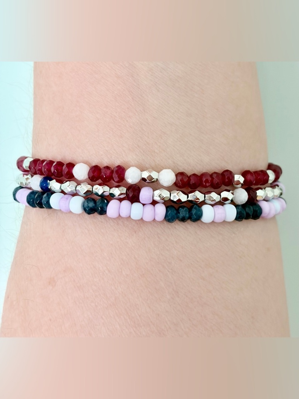 Multicolor 3-strand beaded Bracelet.Red,blue,pink beads,silver-tone spacers.7”.
